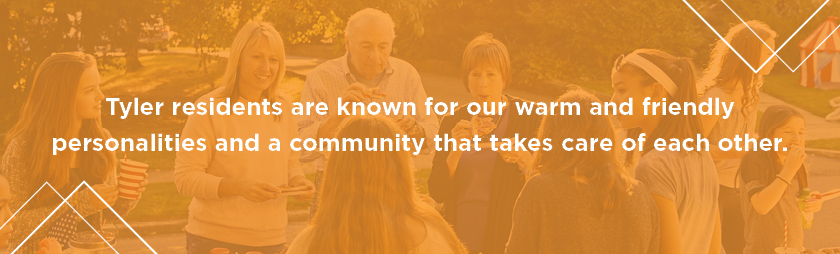 a group of people gathering around a table for food and drinks in after moving to Tyler, Texas